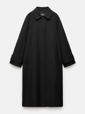 Oversize water-repellent black trench coat